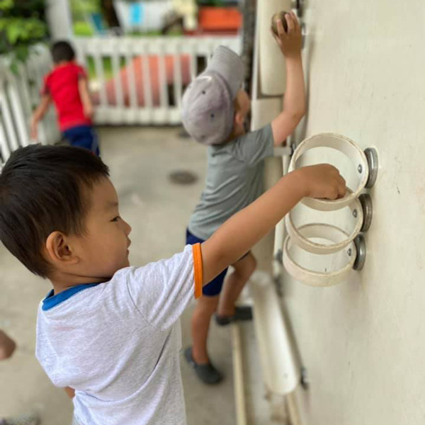 Boy playing in pre school